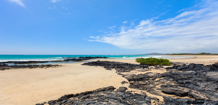 day-six-itinerary-elite-espumilla-beach-rocks